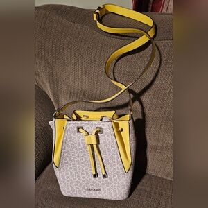 Calvin Klein Monogrammed Vanilla Khaki Daffodil Bucket Drawstring Two way NWT